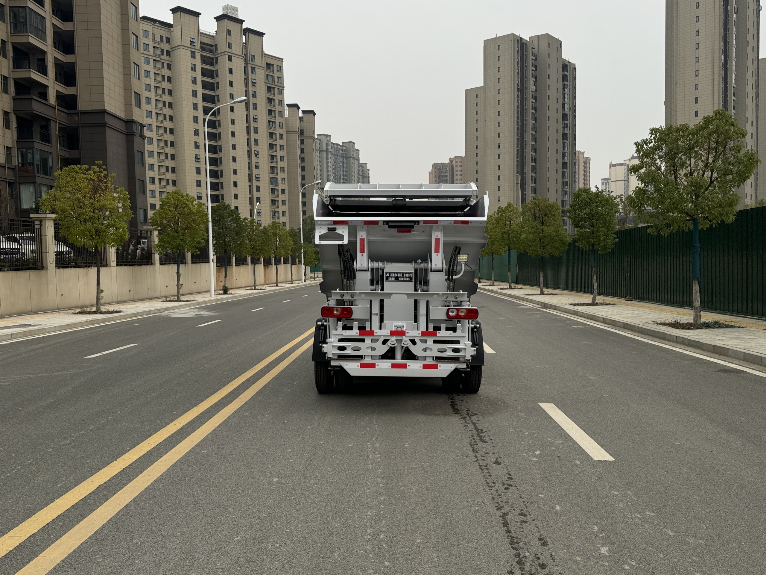 refuse collecting truck