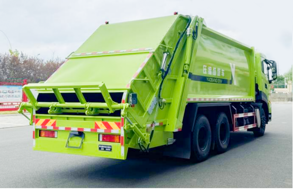Garbage compression transfer vehicle