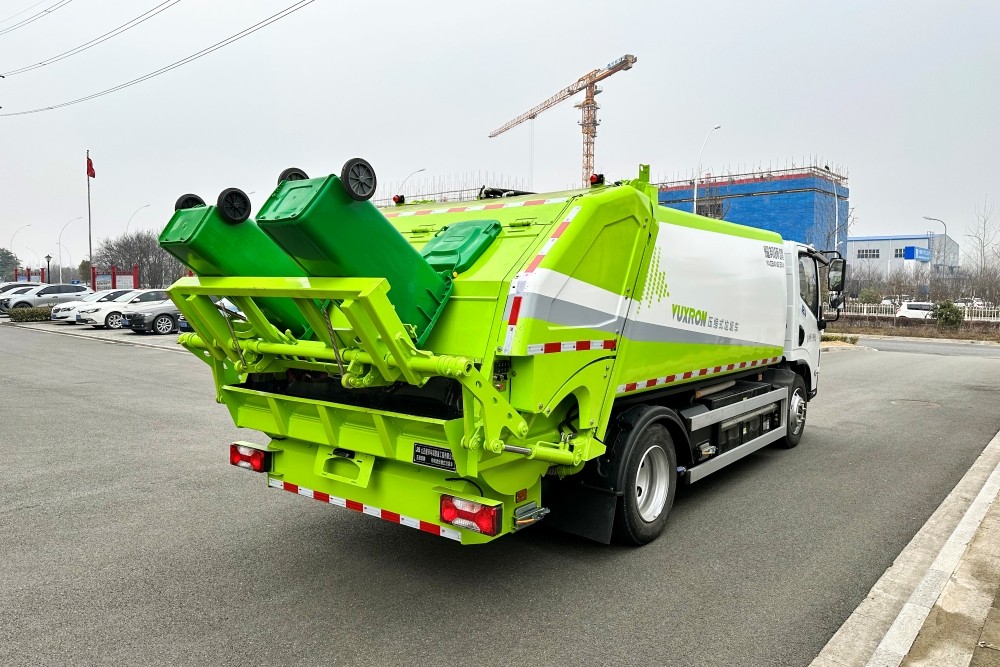 Pure electric road cleaning and sweeping vehicle