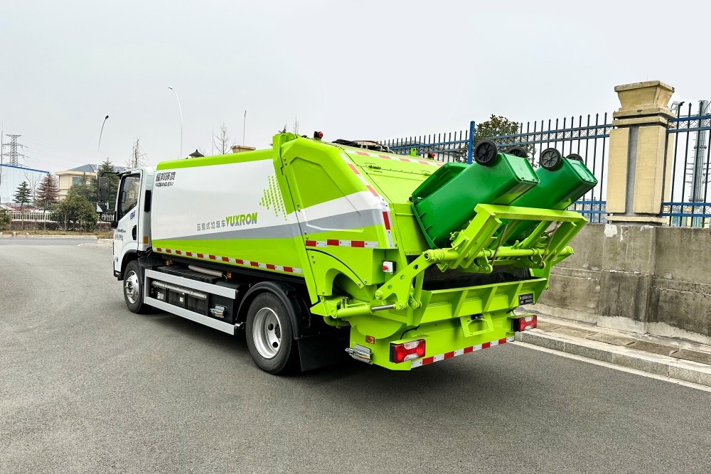 Pure electric road cleaning and sweeping vehicle